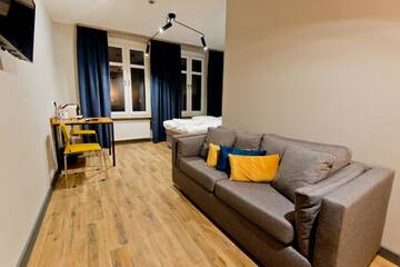 Фото номера Стандартный четырехместный номер Апарт-отели ApartHotel | SORAU г. Жары 9
