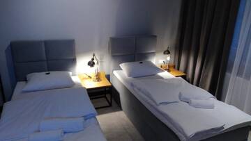 Фото номера Двухместный номер-студио Делюкс с 1 кроватью Апарт-отели ApartHotel | SORAU г. Жары 2
